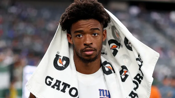 Greg Newsome II 20 of the New York Giants walks on the sideline during the first half.