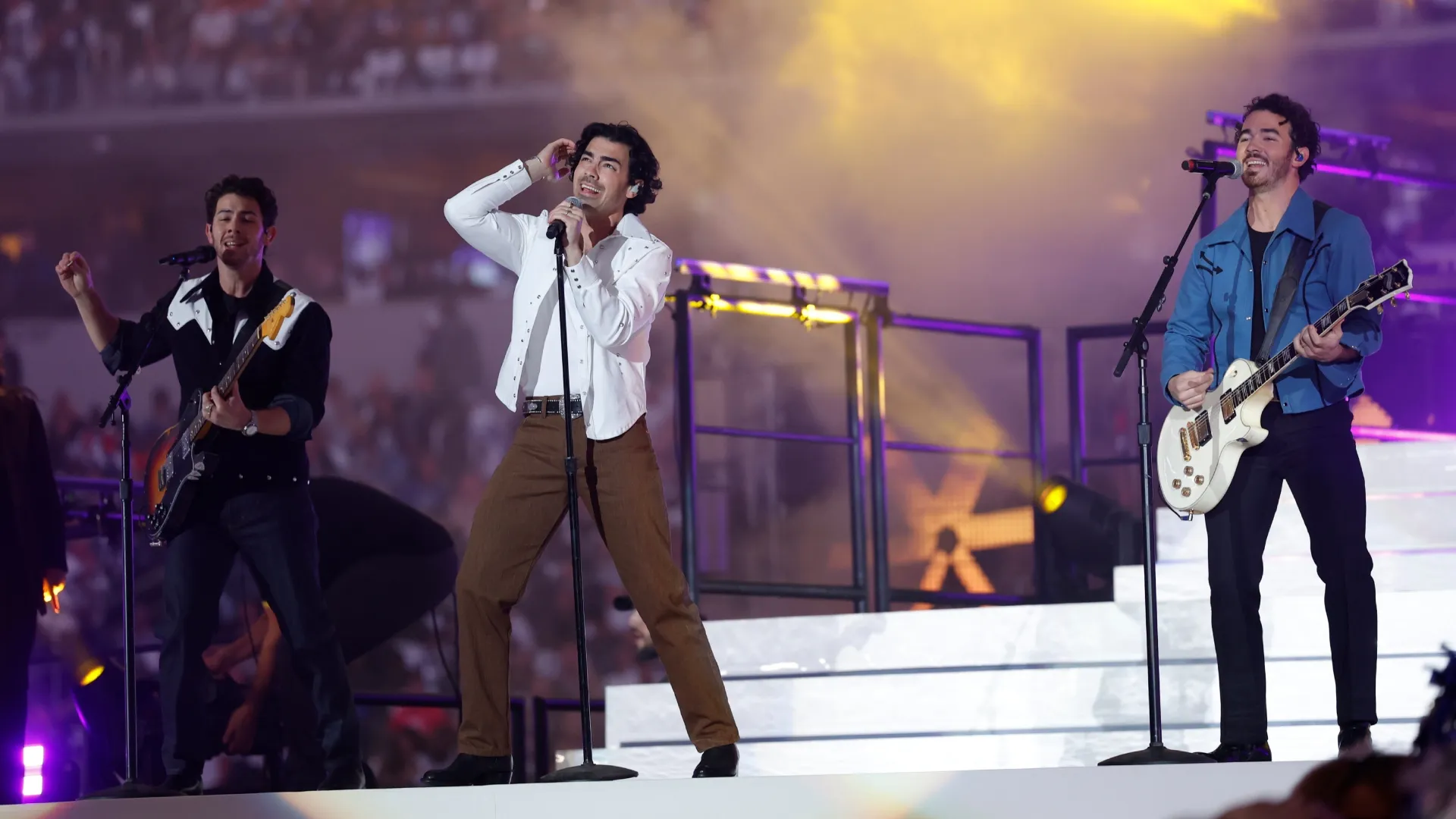 The Jonas Brothers perform during half time in the game between the Giants and the Cowboys in 2022 (Source: Wesley Hitt/Getty Images)
