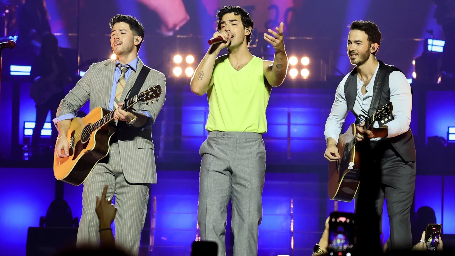 Joe, Nick and Kevin perform on stage during Jonas Brothers: The Burning Up Tour All Over Again – New York (Source: Theo Wargo/Getty Images for Live Nation)