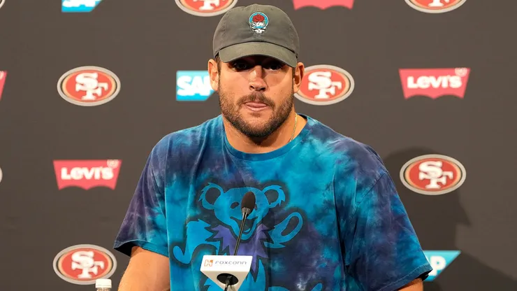 Nick Bosa #97 of the San Francisco 49ers talks with the media.