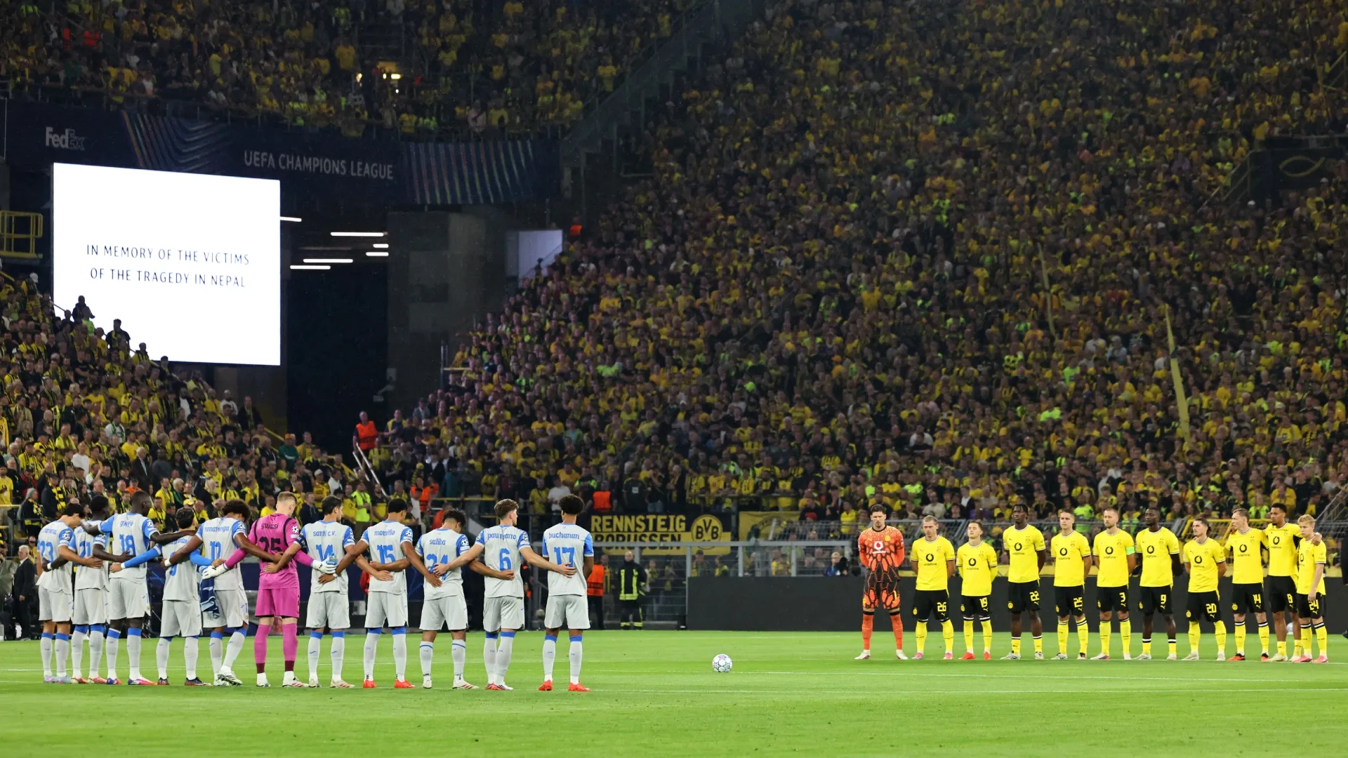 “In memory of the victims of the tragedy in Nepal,” UEFA’s message in minute of silence.