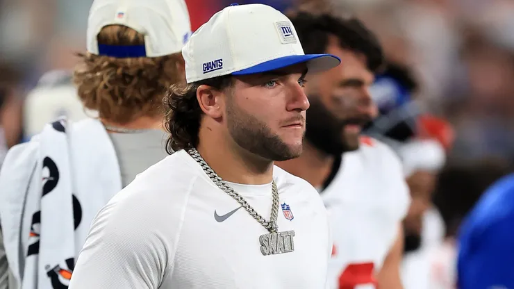 Cam Skattebo #44 of the New York Giants looks on from the sideline.