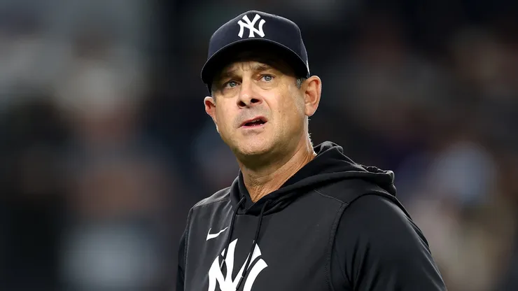 Manager Aaron Boone #17 of the New York Yankees walks.