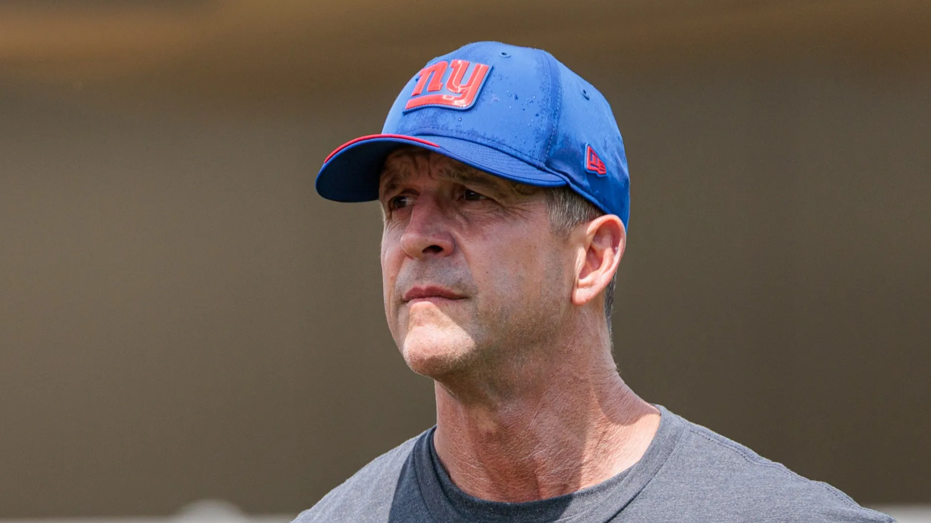 Head coach John Harbaugh of the New York Giants looks on during training camp at The Greenbrier on August 3, 2026 in White Sulphur Springs, West Virginia.