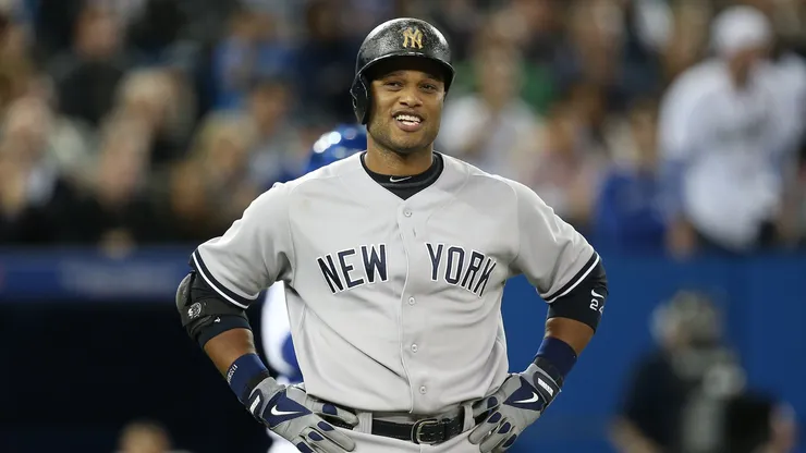 Robinson Cano #24 of the New York Yankees reacts.