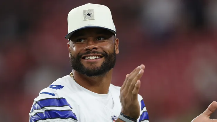 Dak Prescott #4 of the Dallas Cowboys warms up before the preseason NFL game.