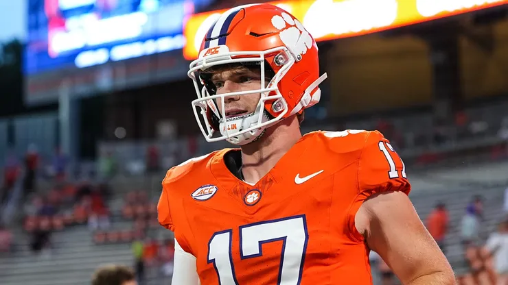 Quarterback Christopher Vizzina #17 of the Clemson Tigers runs onto the field.