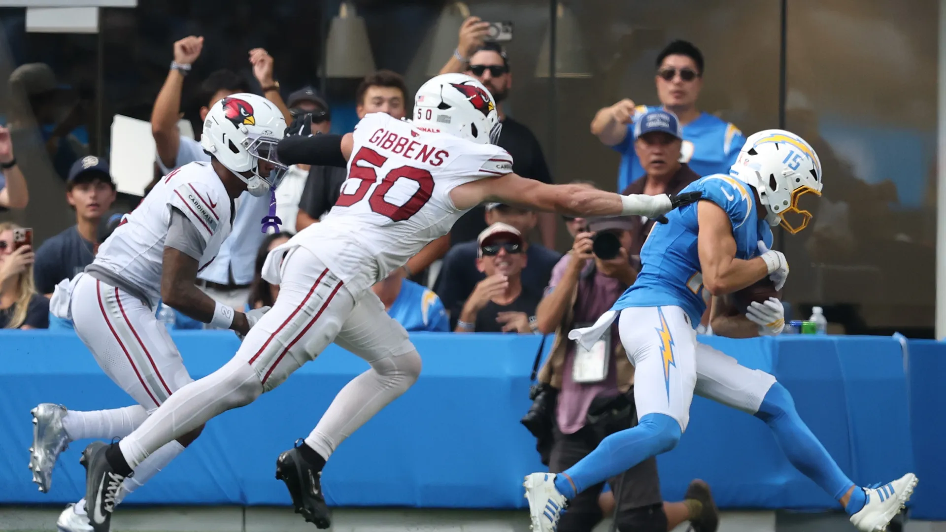 Ladd McConkey catches a touchdown pass.