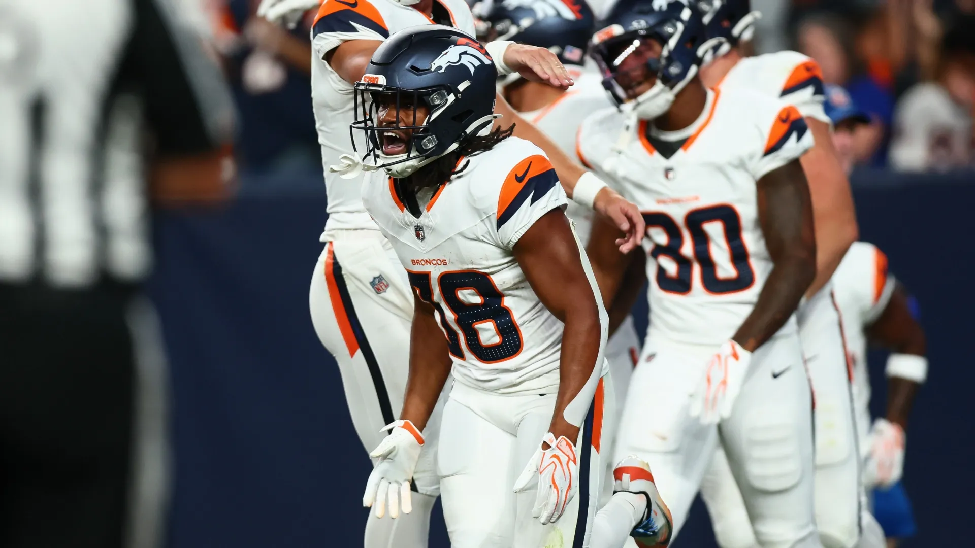 Jaleel McLaughlin #38 of the Broncos celebrates after scoring a touchdown (Source: Justin Edmonds/Getty Images)