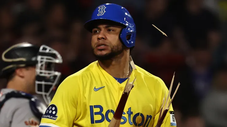 Willson Contreras #40 of the Boston Red Sox snaps his bat in half after lining out.
