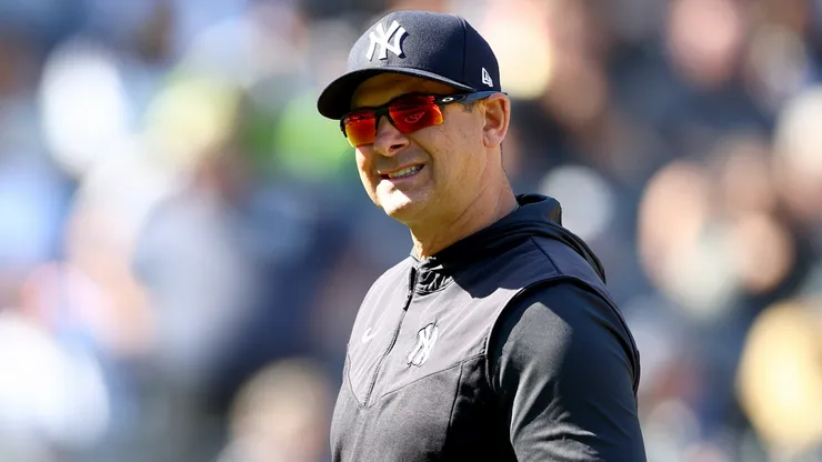 Manager Aaron Boone #17 of the New York Yankees heads to the dugout.