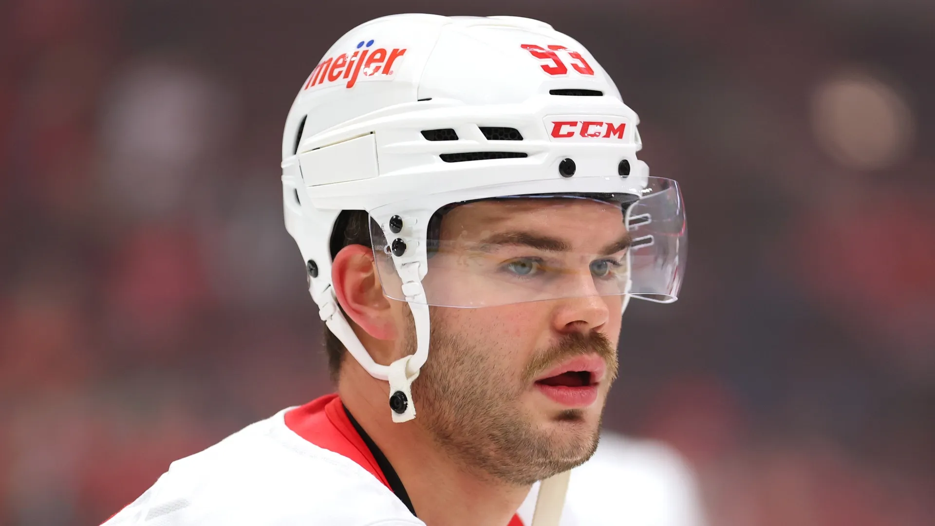 Alex DeBrincat #93 of the Detroit Red Wings looks on prior to the game against the Chicago Blackhawks at the United Center on November 06, 2024 in Chicago, Illinois.