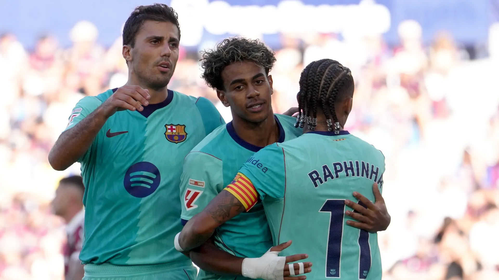 Rodri, Lamine Yamal and Raphina during the LaLiga EA Sports 2026/27 match (Source: Alex Caparros/Getty Images)