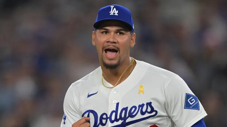 Edgardo Henriquez #60 of the Los Angeles Dodgers reacts.