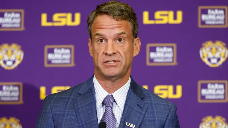 Lane Kiffin speaks at a press conference.