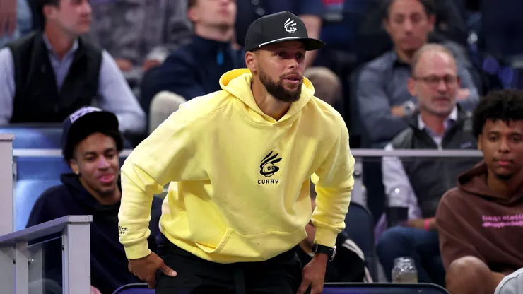 Stephen Curry of the Golden State Warriors looks on.