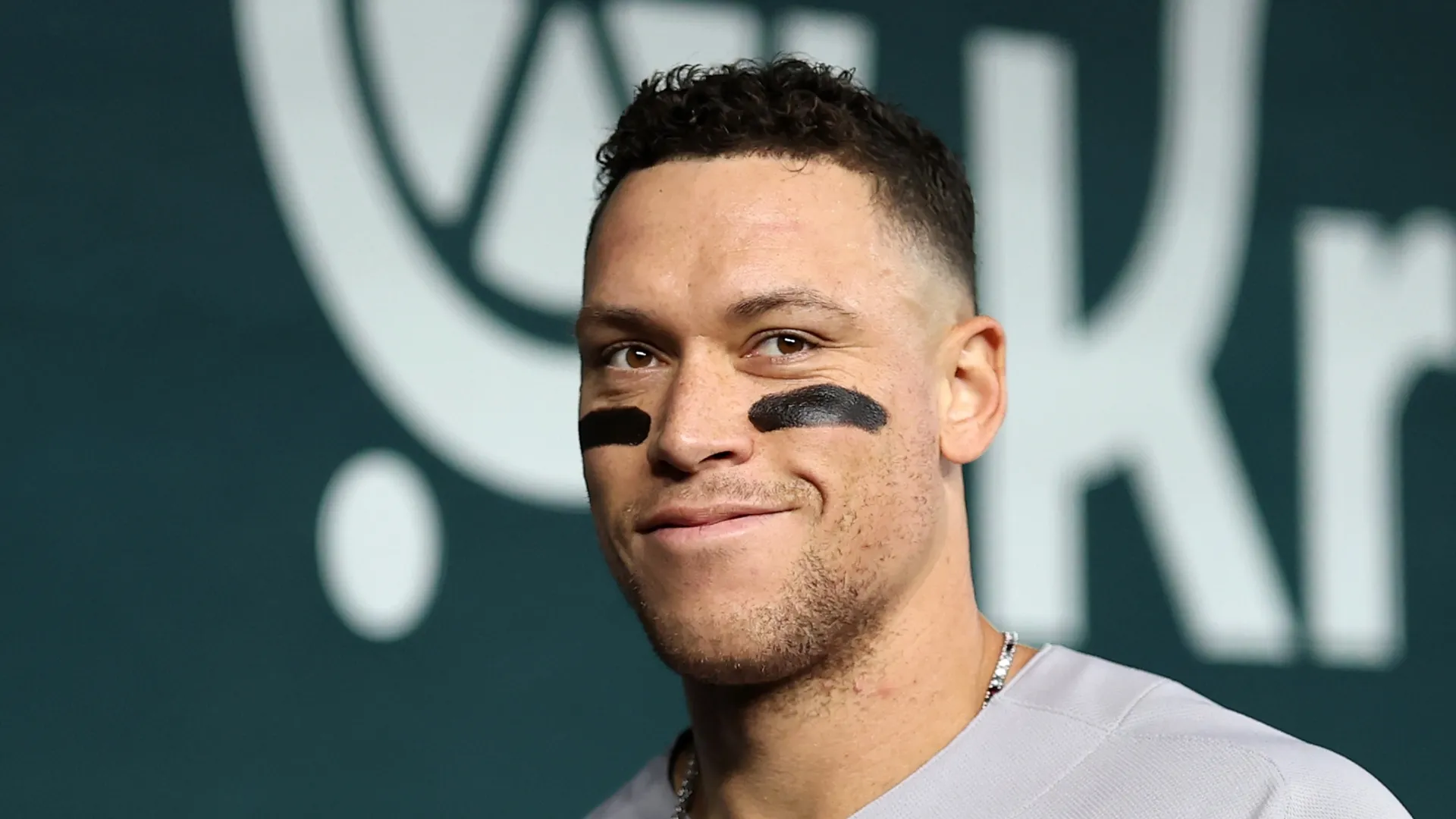 Aaron Judge #99 of the New York Yankees walks through the dugout prior to a game against the Texas Rangers at Globe Life Field on April 29, 2026 in Arlington, Texas.