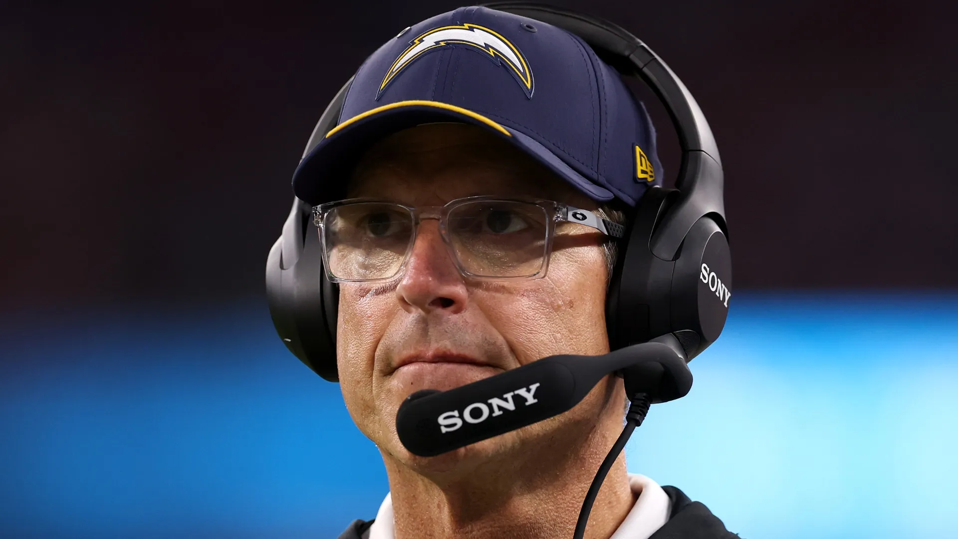 Head coach Jim Harbaugh of the Los Angeles Chargers looks on against the San Francisco 49ers in a preseason game at SoFi Stadium on August 20, 2026 in Inglewood, California.