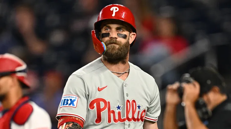 Bryce Harper #3 of the Philadelphia Phillies walks back to the dugout.