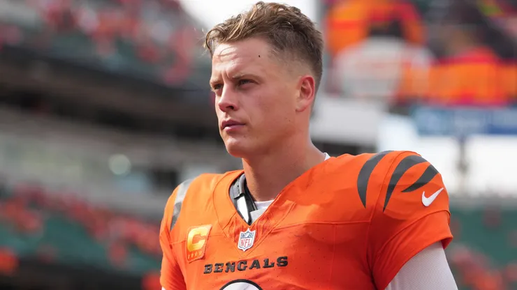 Joe Burrow #9 of the Cincinnati Bengals walks off the field after 33-27 win.