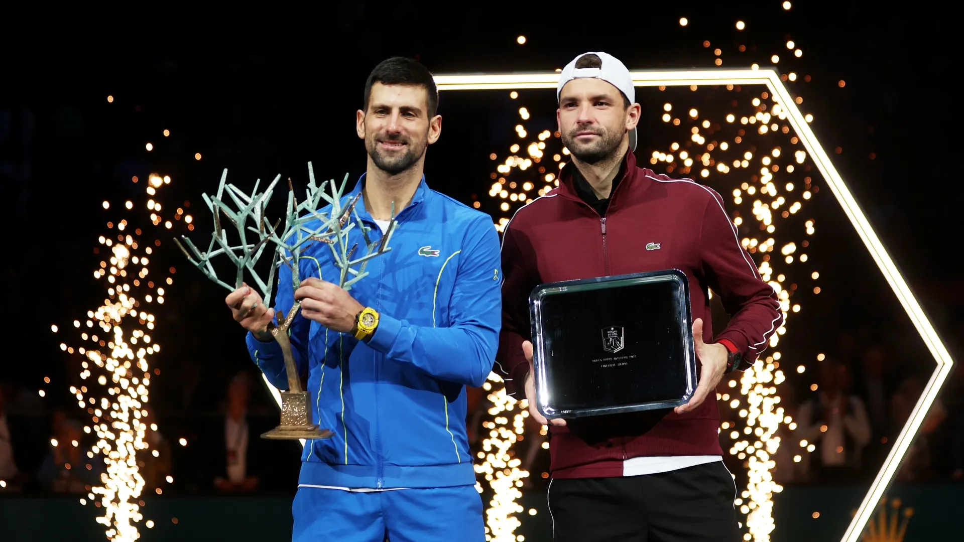 Novak Djokovic and Grigor Dimitrov pose for a photo after the final of the 2023 Paris Masters.