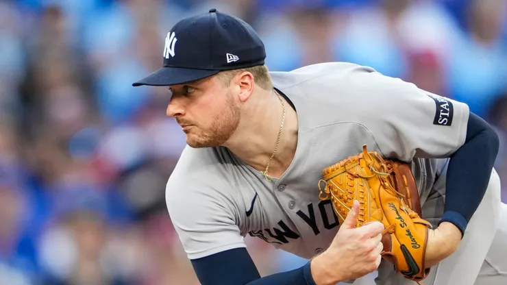 Clarke Schmidt #36 of the New York Yankees pitches against the Toronto Blue Jays.