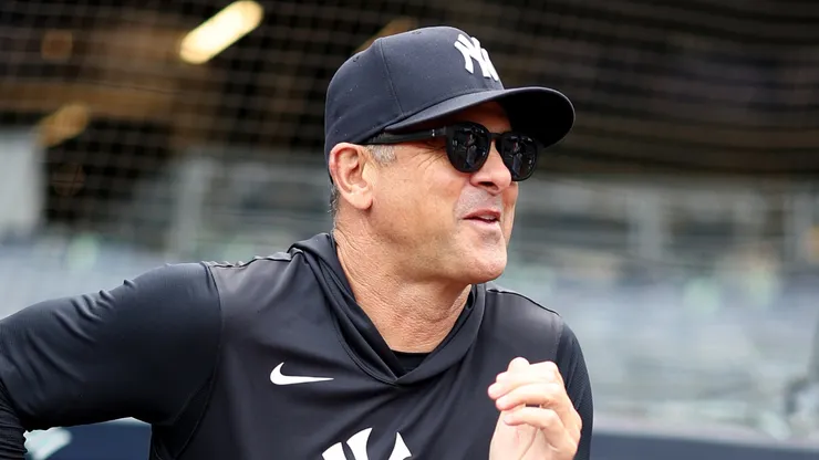 Manager Aaron Boone #17 of the New York Yankees walks out.