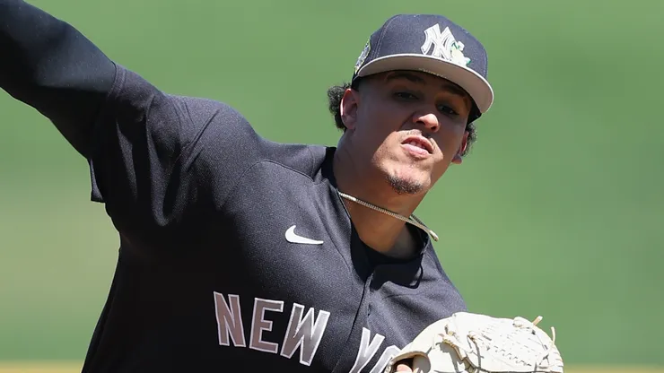 Starting pitcher Carlos Lagrange #84 of the New York Yankees throws.