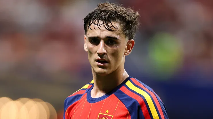 Gavi #9 of Spain looks on.