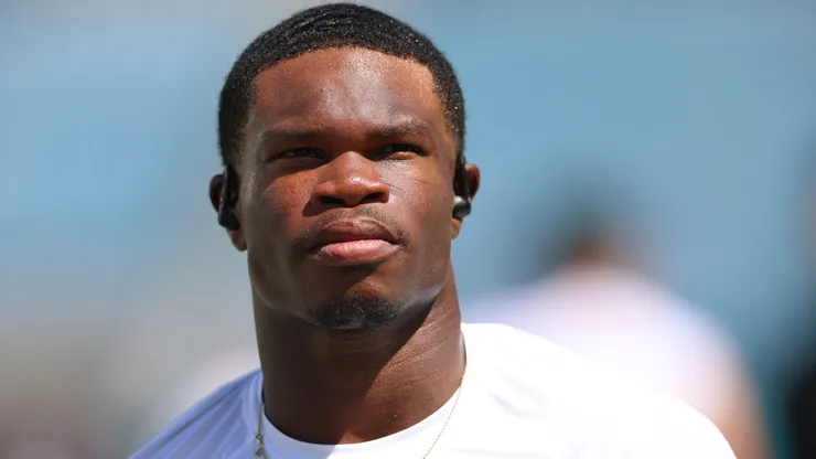 Travis Hunter #12 of the Jacksonville Jaguars warms up prior to the game.