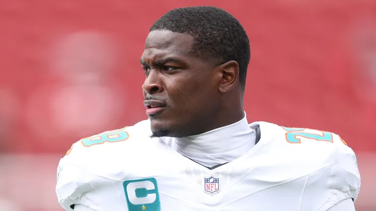De'von Achane #28 of the Miami Dolphins looks on before a game.