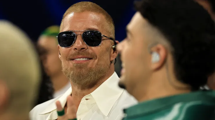 Ricky Martin prepares to perform during halftime at the game between the Baltimore Ravens and the Dallas Cowboys