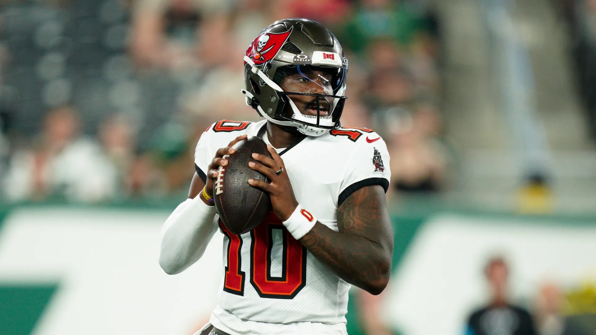 Jalon Daniels #10 of the Tampa Bay Buccaneers looks to pass in the third quarter against the New York Jets at MetLife Stadium on August 14, 2026 in East Rutherford, New Jersey.