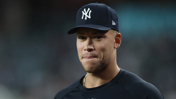 Aaron Judge #99 of the New York Yankees walks on the field.