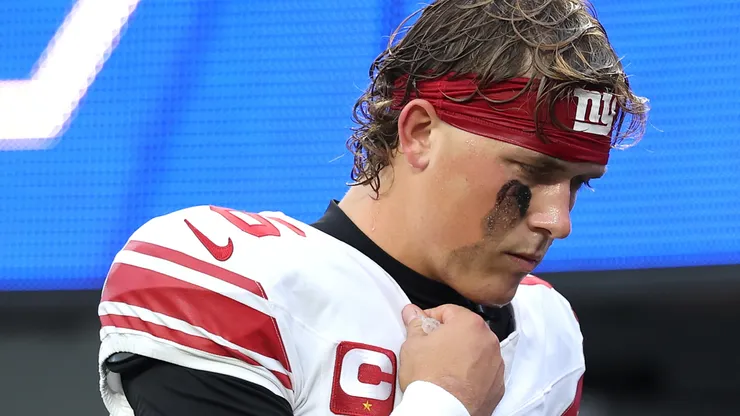 Jaxson Dart #6 of the New York Giants walks back to the locker room.