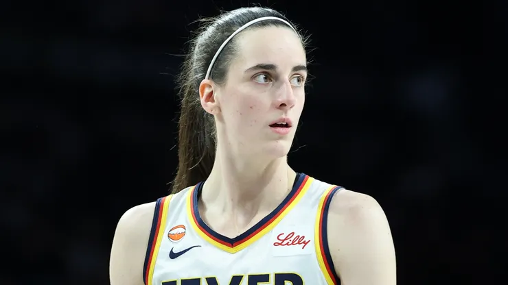 Caitlin Clark #22 of the Indiana Fever walks on the court during a break.
