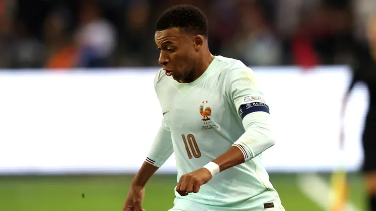 Kylian Mbappe of France runs with the ball.