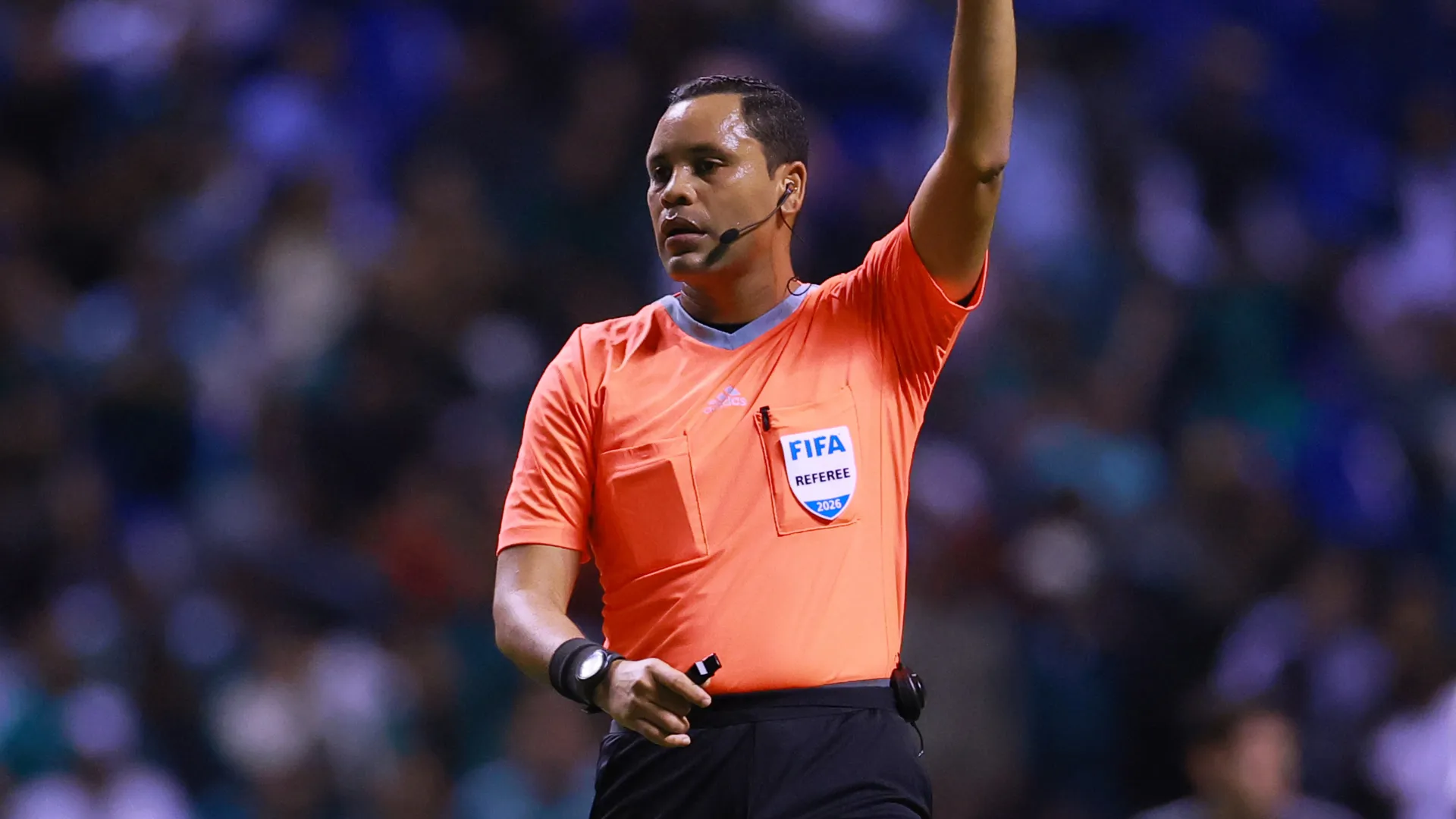Referee Selvin Brown reacts.