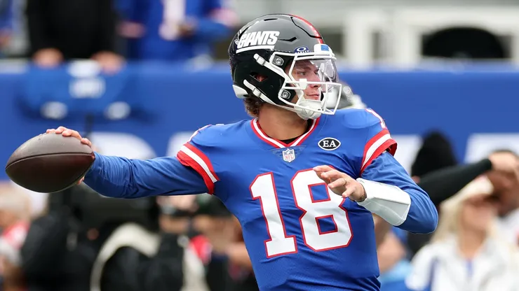 J.J. McCarthy of the New York Giants warms up before the game against the Arizona Cardinals.
