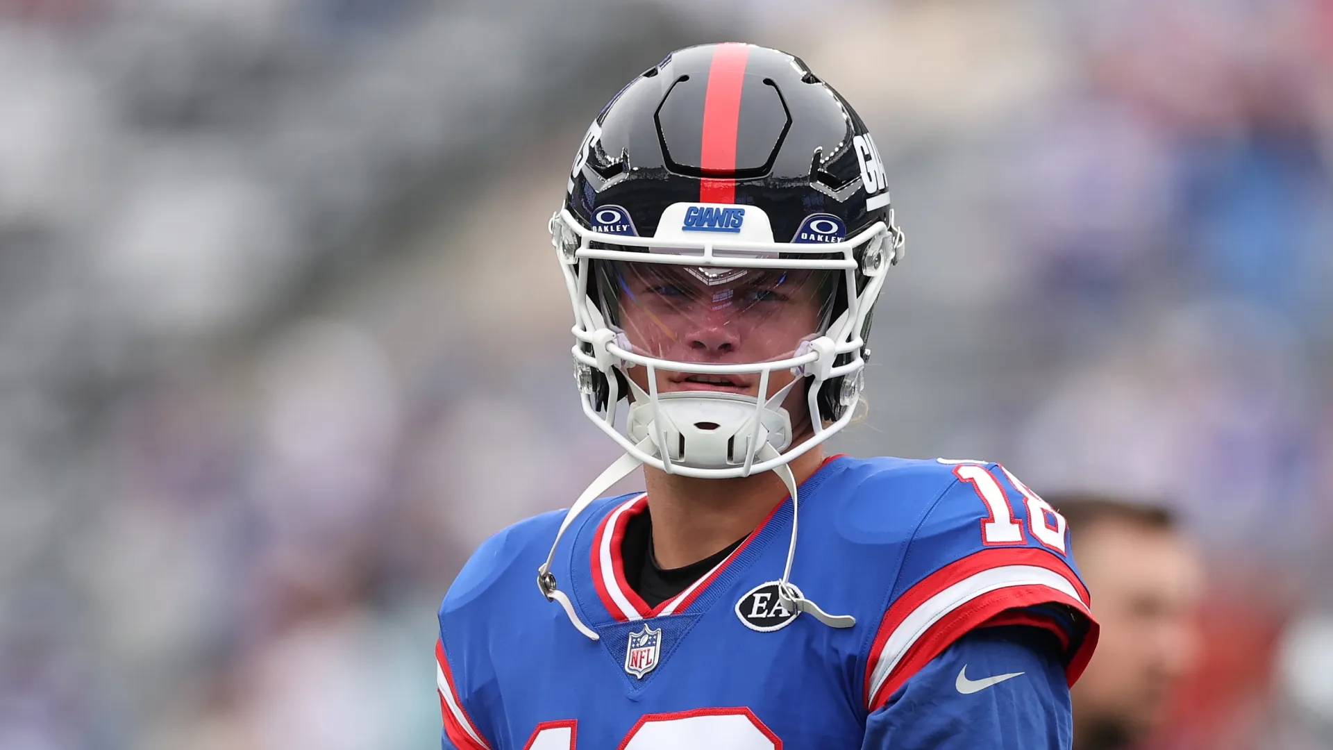 J.J. McCarthy #18 of the New York Giants looks on during warmups before the game against the Arizona Cardinals at MetLife Stadium on October 04, 2026 in East Rutherford, New Jersey.