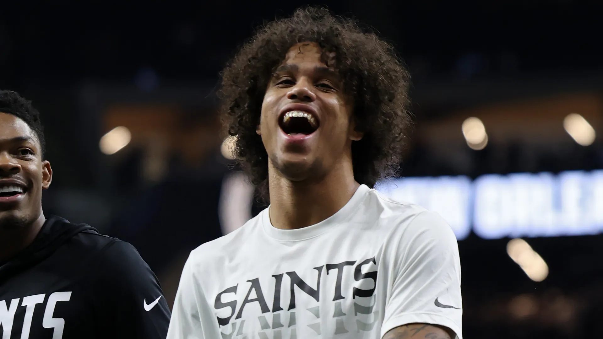 Jordyn Tyson of the New Orleans Saints walks on the field.