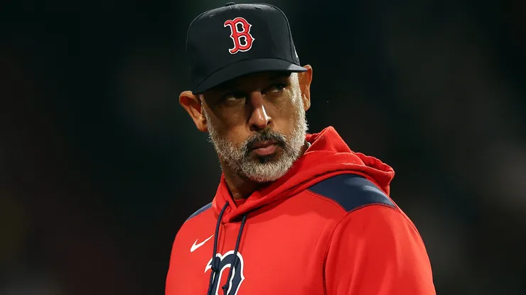 Former Boston Red Sox manager Alex Cora looks on during the fourth inning.