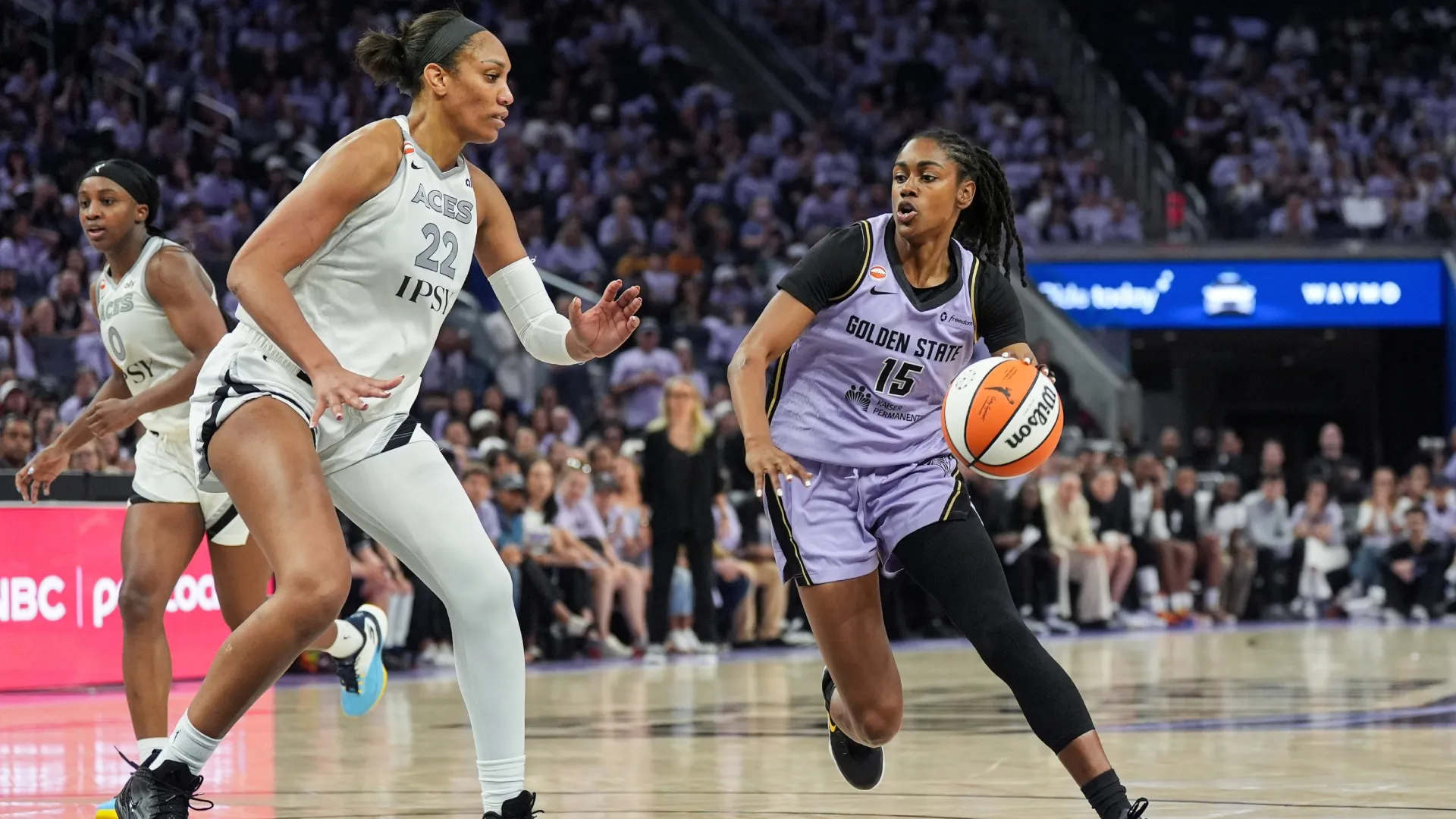 Tiffany Hayes #15 of the Valkyries dribbles with the ball against A’ja Wilson #22 of the Aces (Source: Kavin Mistry/Getty Images)