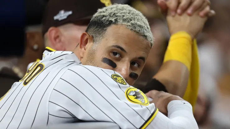 Manny Machado #13 of the San Diego Padres looks on.