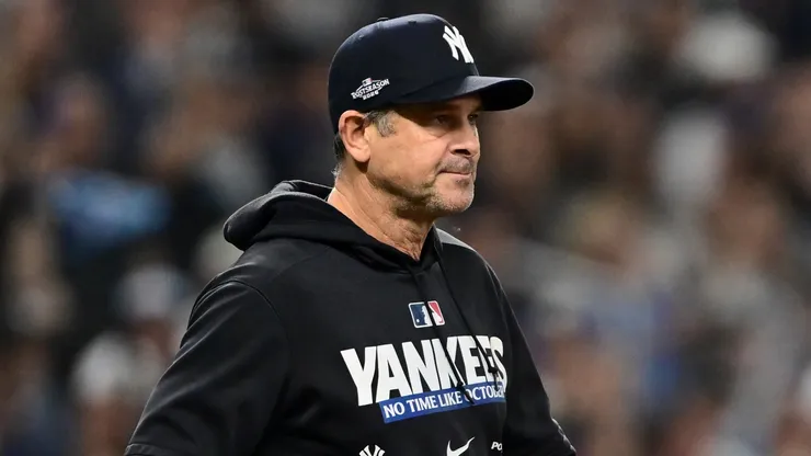 Manager Aaron Boone #17 of the New York Yankees walks out.