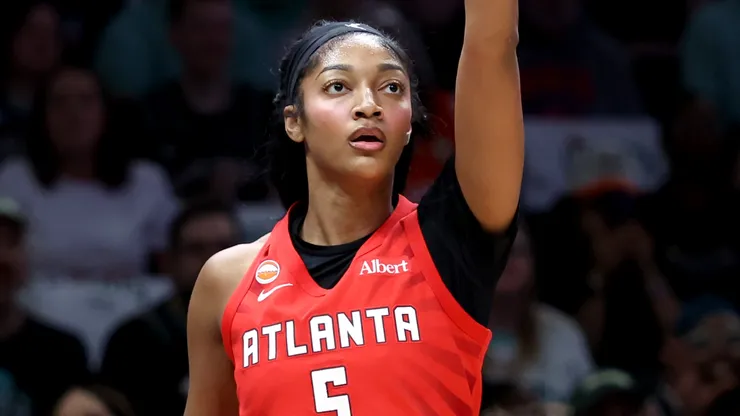 Angel Reese #5 of the Atlanta Dream reacts after making a basket.