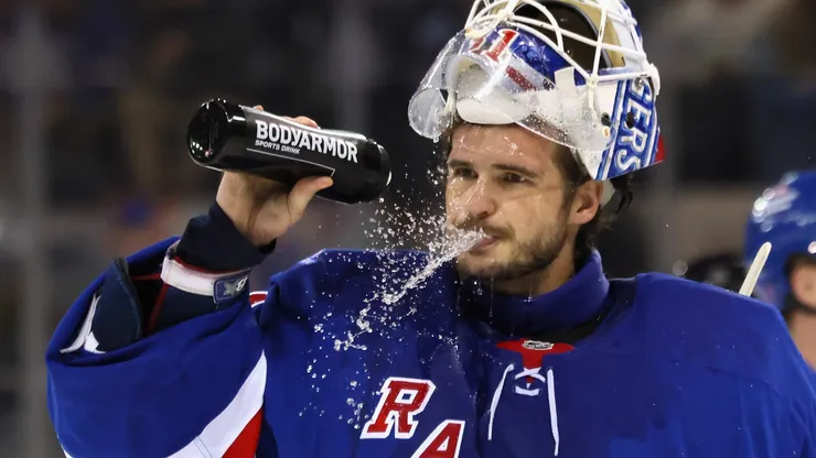 Igor Shesterkin #31 of the New York Rangers takes a second period water break.