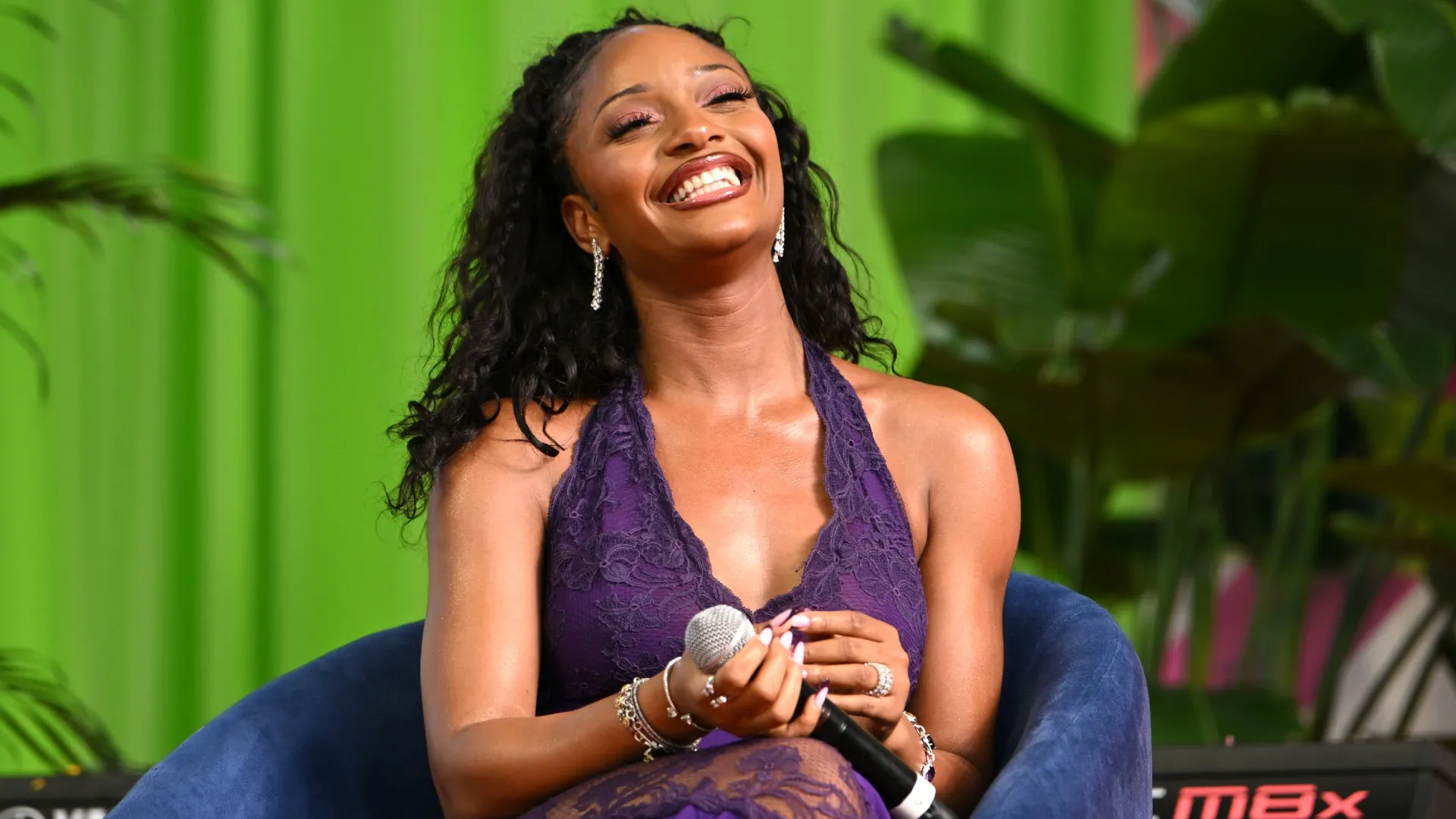 Ayra Starr speaks onstage during the 2026 Teen Vogue Fest (Source: Bryan Bedder/Getty Images for 2026 Teen Vogue Fest)