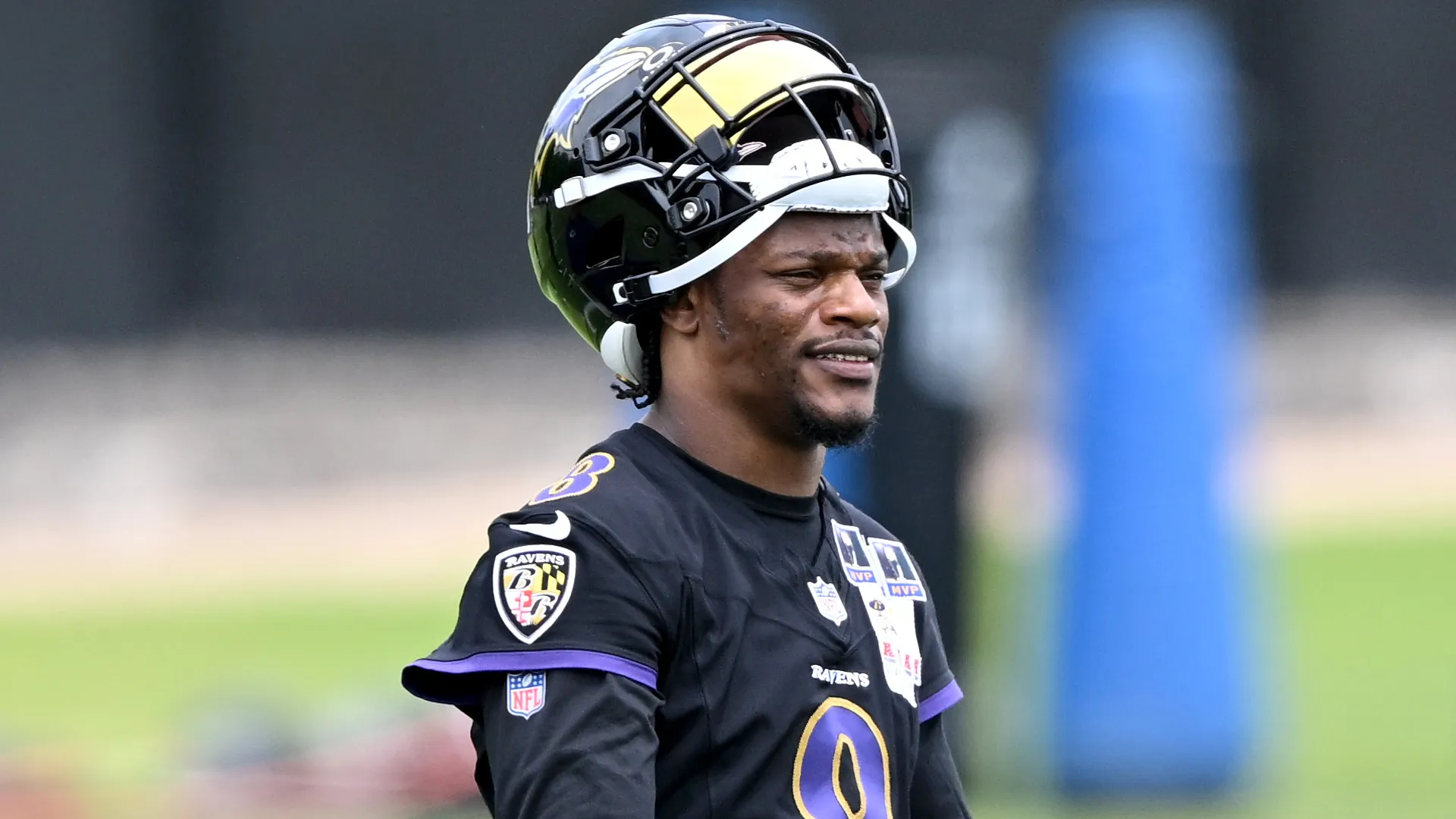 Lamar Jackson #8 of the Baltimore Ravens looks away.