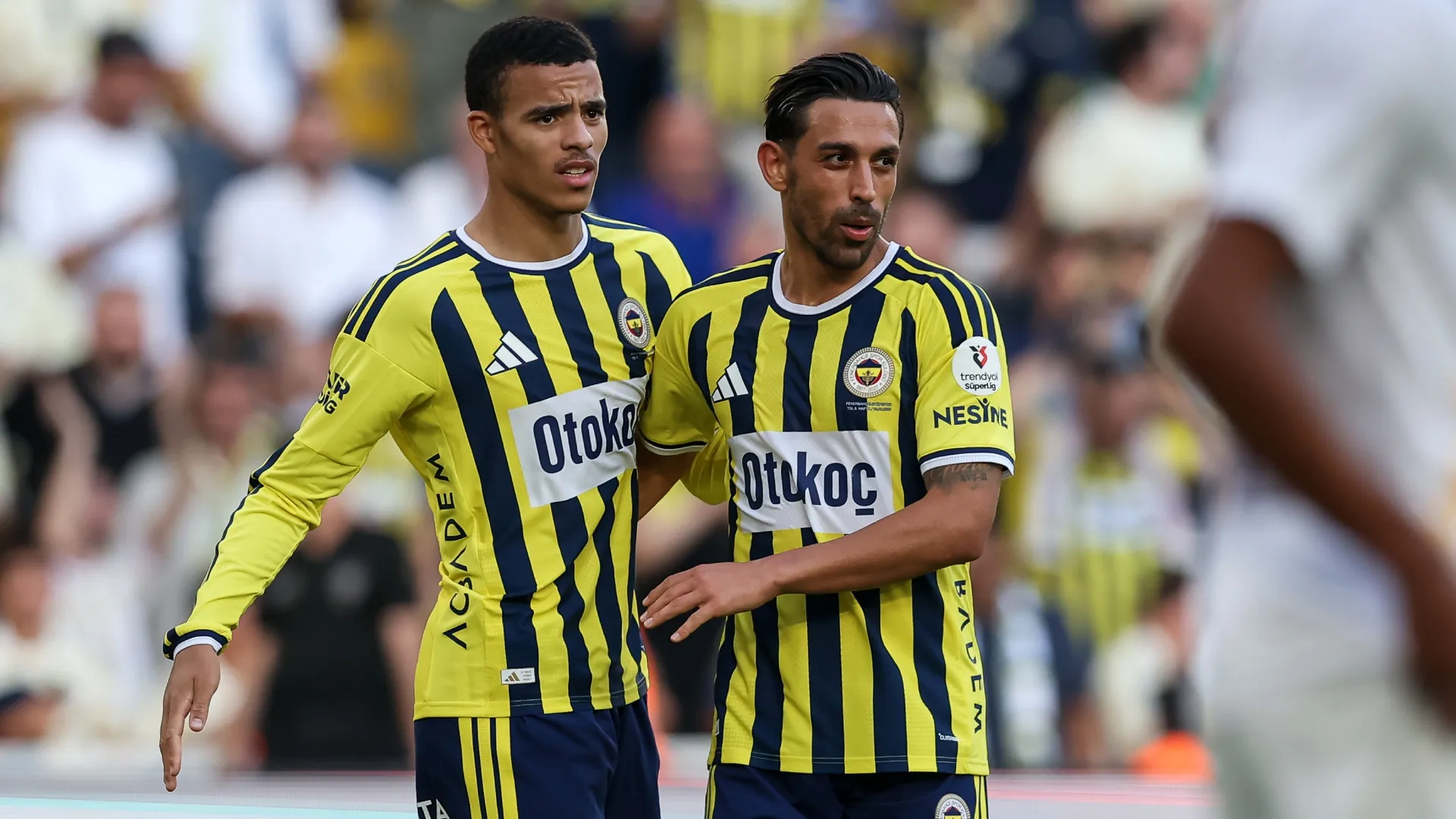 Irfan Kahveci of Fenerbahce celebrates with his teammate Mason Greenwood (Source: Ahmad Mora/Getty Images)